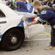 Illustration for article titled Look At This U-18 Canadian Water Polo Player Trying To Blow Up A Vancouver Police Cruiser